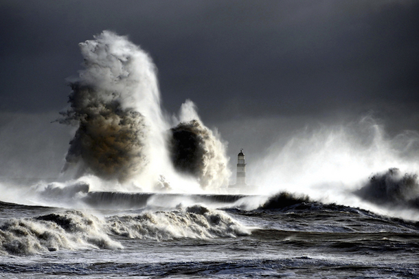 Gale Force winds from the North make spectacular pictures at the harbour in Seaham, northeast England, as they batter the seafront. (Owen Humphreys/AP)