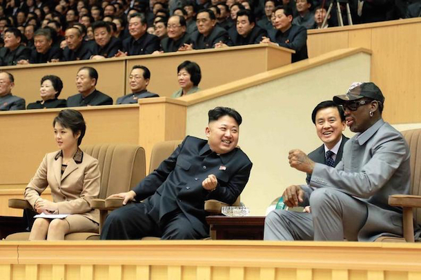 North Korean leader Kim Jong Un watches a basketball game with Dennis Rodman. (KCNA)