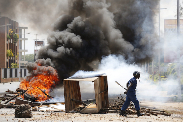 Clashes between protesters and police in Burundi. (Goran Tomasevic/Reuters)