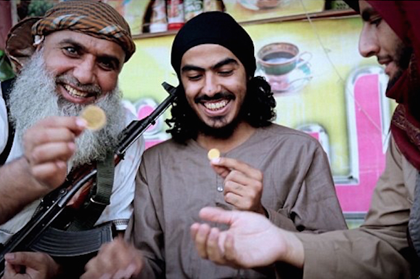 Smiling happy jihadists holding brand new gold dinars. (Screengrab)
