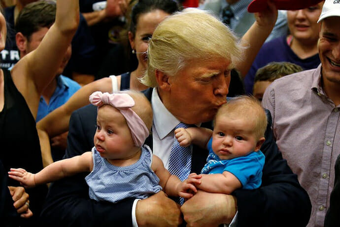 Donald Trump kissing a baby