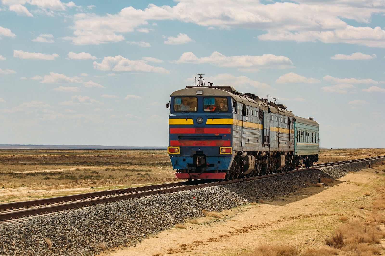 Train passing through Kazakhstan desert