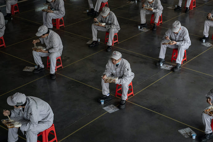 Chinese workers on a lunch break