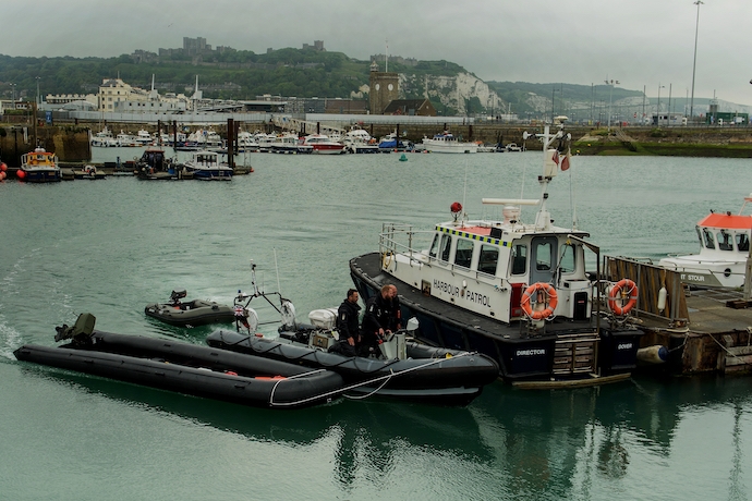 Border patrol agents and boats in Dover