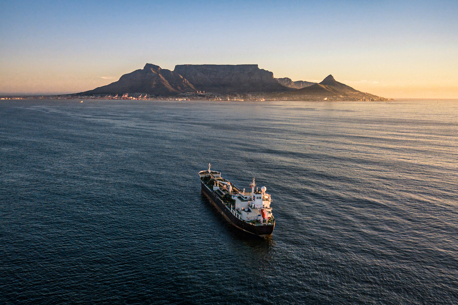 A vessel leaves Cape Town Port, South Africa