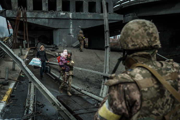 Ukrainian civilians fleeing Russian shelling