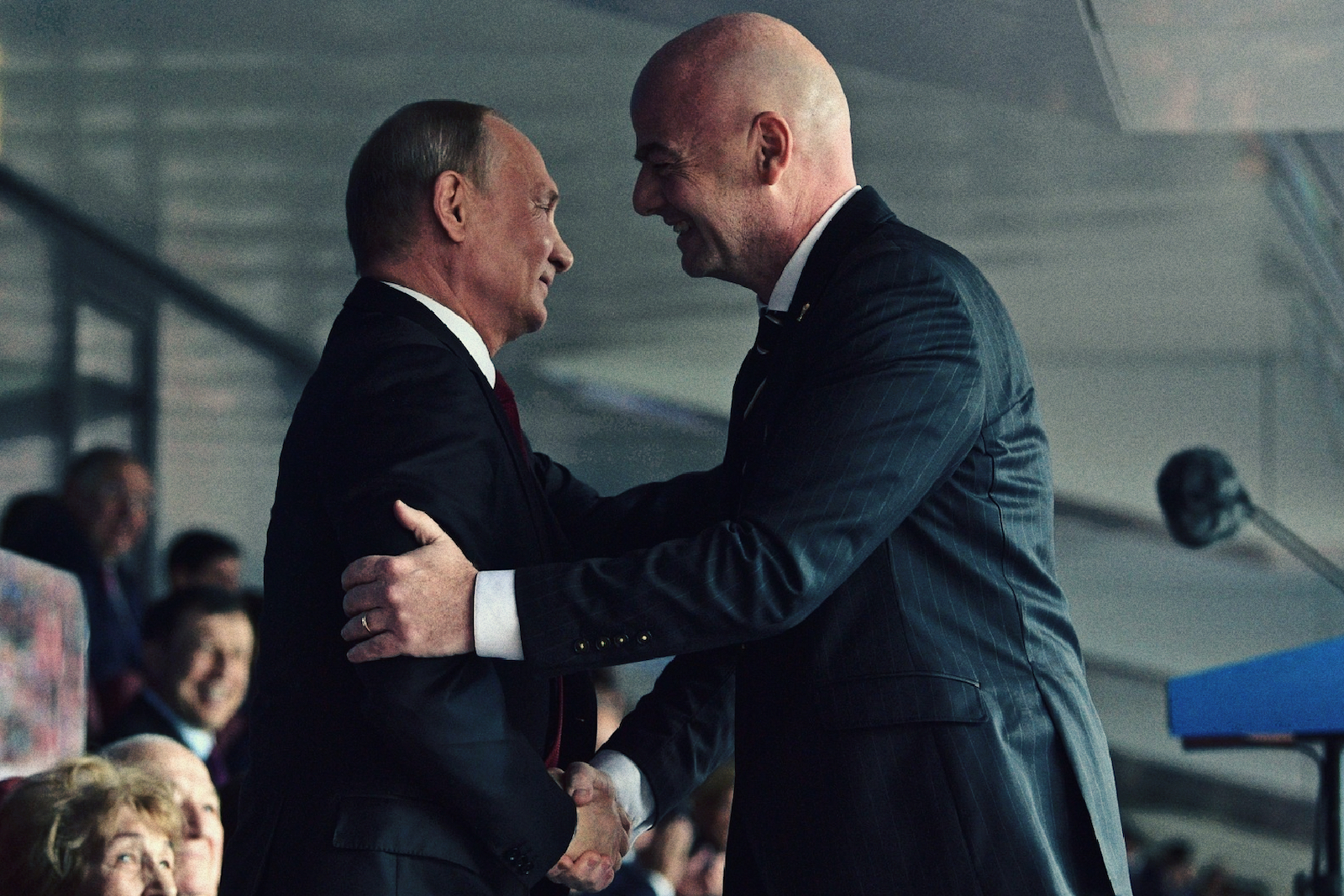 Gianni Infantino embraces Vladimir Putin