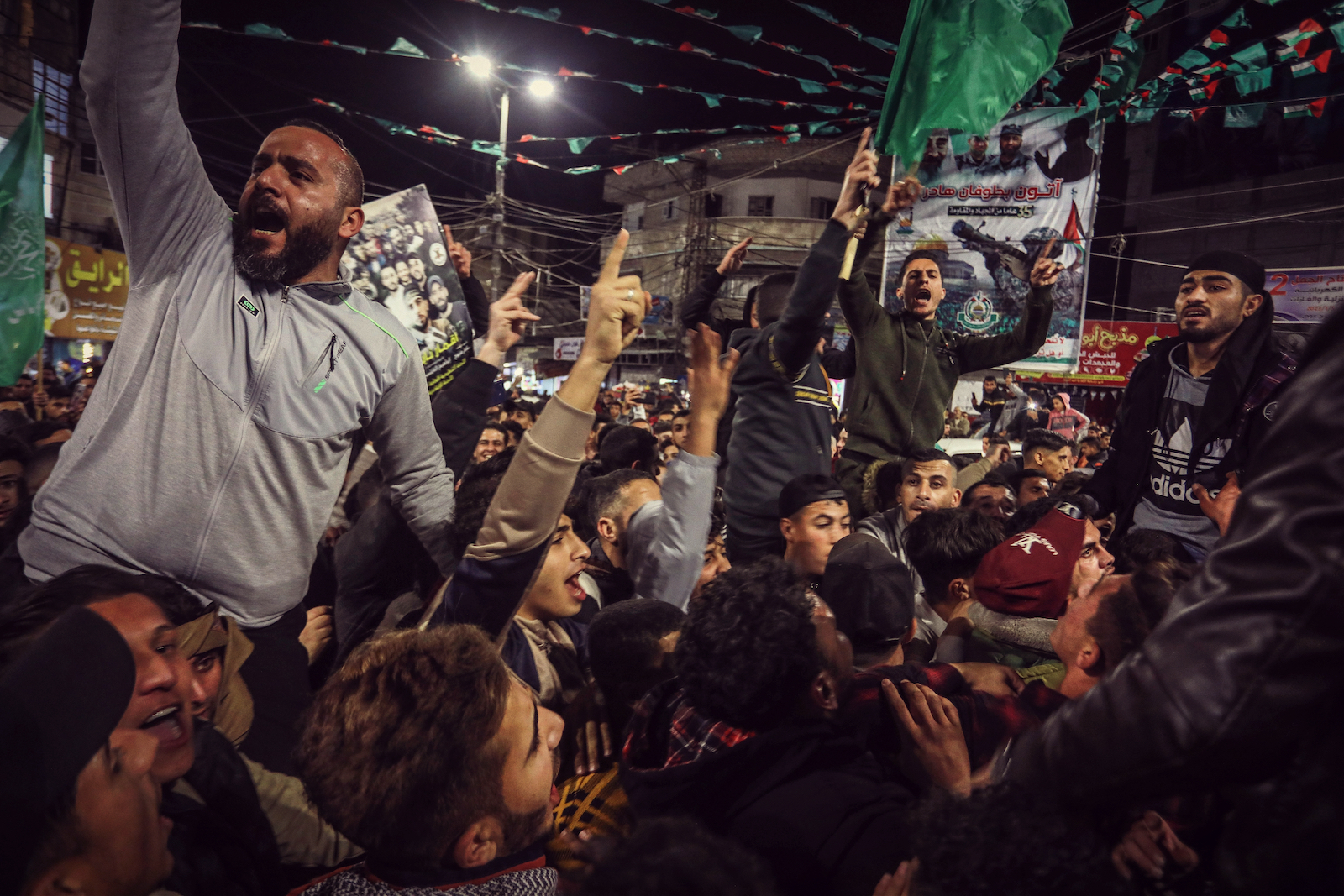 Palestinians celebrating the attack on a synagogue in East Jerusalem