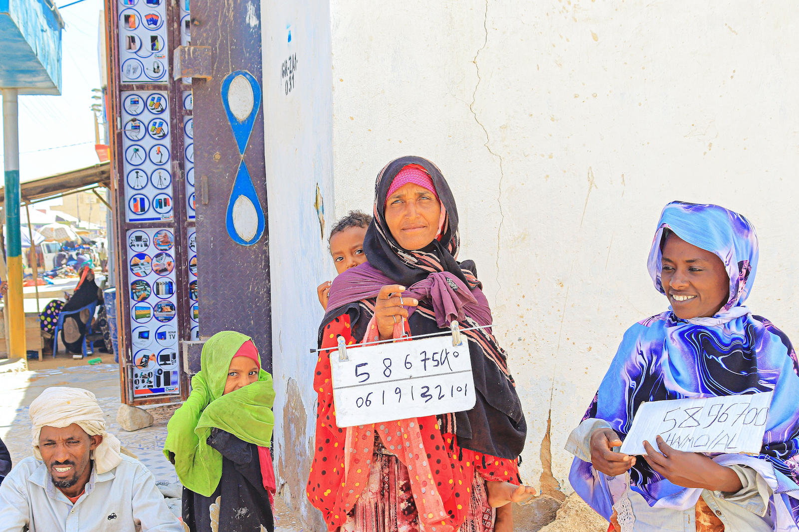Ethiopian refugees showing mobile banking numbers pleading for help in Galkayo, Puntland