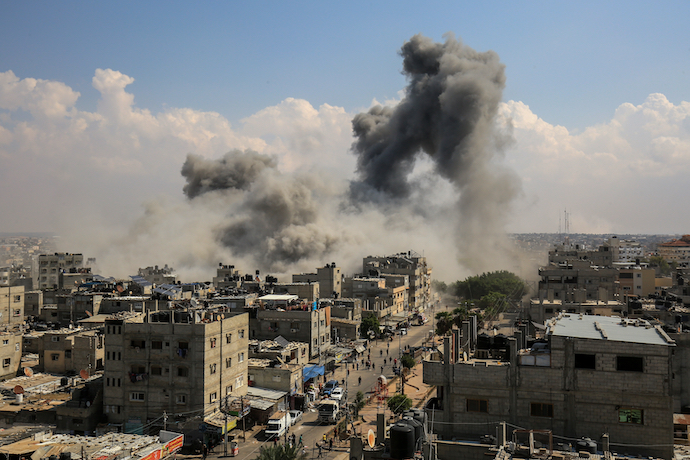 Smoke rises after Israeli air strikes of the city of Rafah in the southern Gaza Strip, October 10, 2023