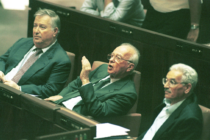 Israeli Prime Minister Yitzhak Rabin listening to Netanyahu's speech on the floor of the Knesset in 1995 during debate on the Oslo B' agreement