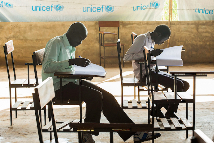 South Sudanese students sitting for school exams