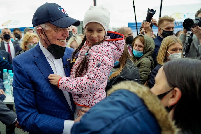 Joe Biden with Ukrainian refugees in Warsaw, Poland