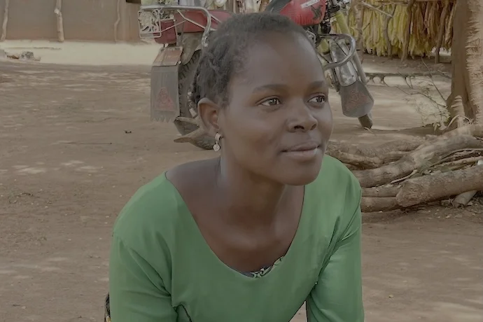 Elphina Joseph, whose husband was killed by an elephant. She now works as a farm worker, earning an annual salary of about $300