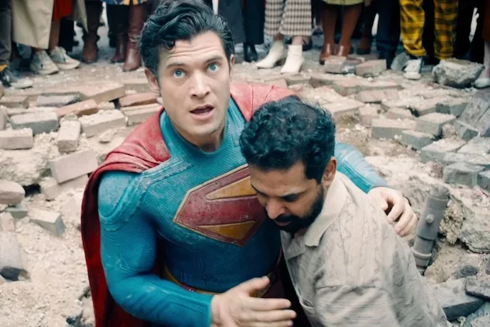 Superman being helped up by Malik