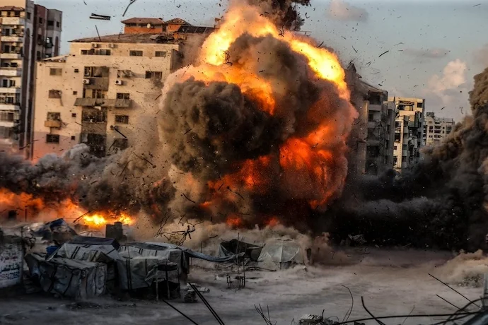Israel destroying a Gaza City high-rise building