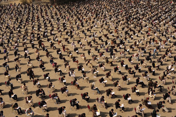 Young Afghans taking university entrance exams in 2015